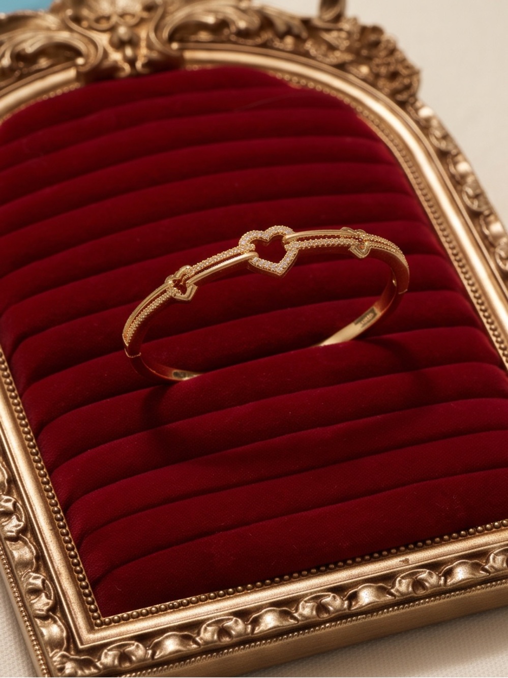 Gold Plated Interlocking Heart CZ Bangle Bracelet – 7 Inches